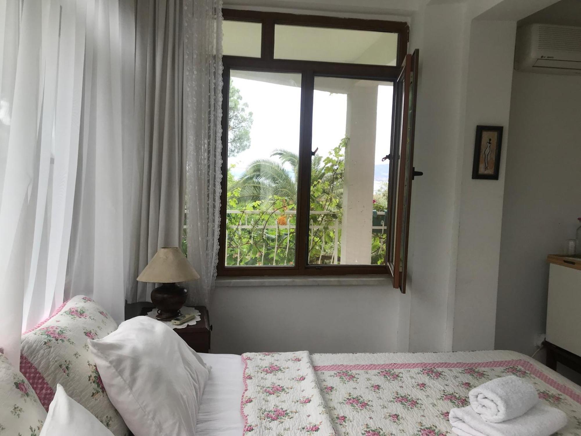 Gunebakan Taliani Hotel ไอวาลิค ภายนอก รูปภาพ