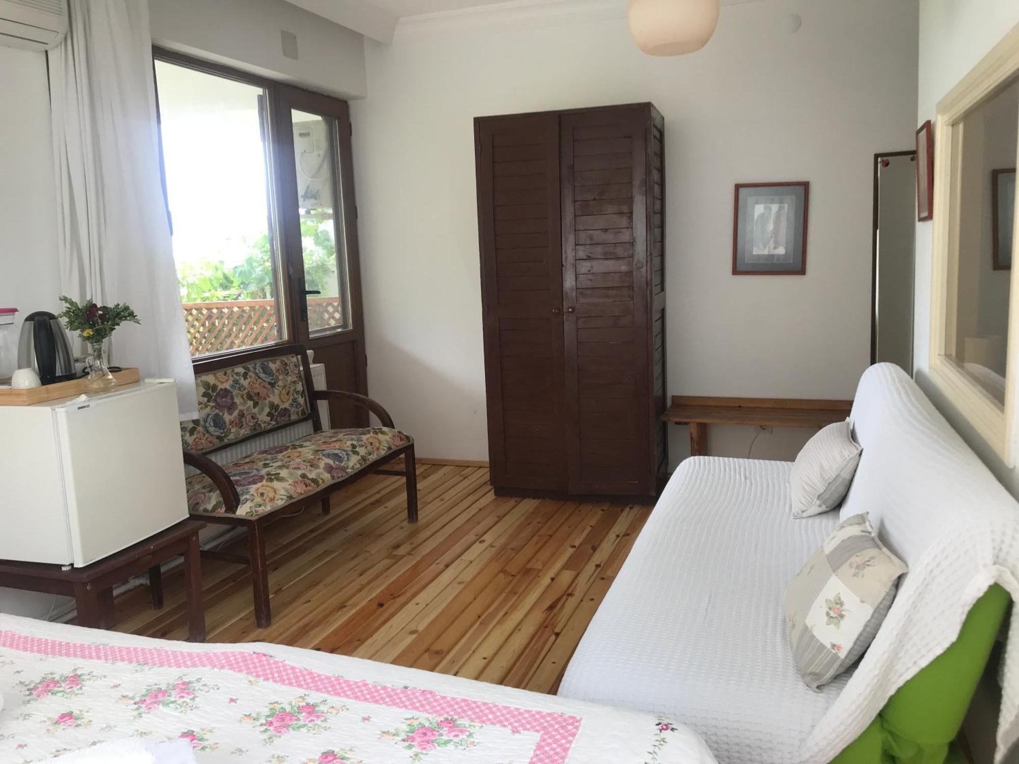 Gunebakan Taliani Hotel ไอวาลิค ภายนอก รูปภาพ