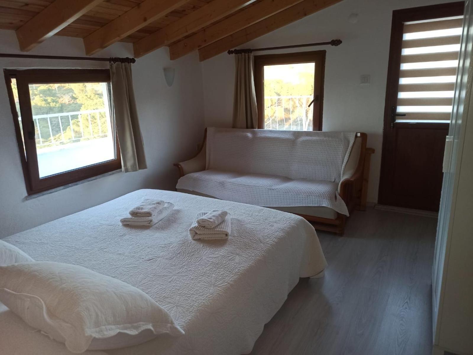 Gunebakan Taliani Hotel ไอวาลิค ภายนอก รูปภาพ