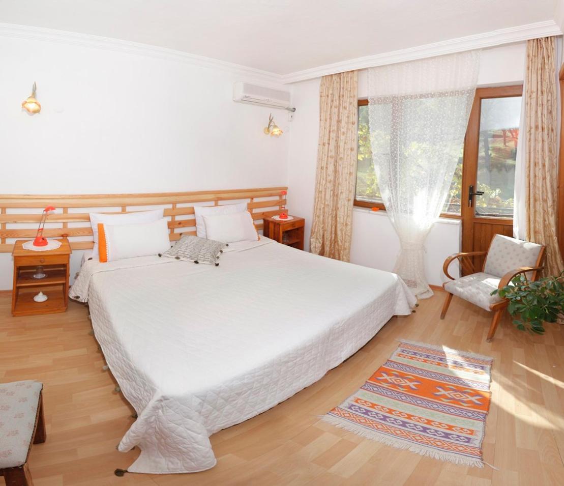 Gunebakan Taliani Hotel ไอวาลิค ภายนอก รูปภาพ